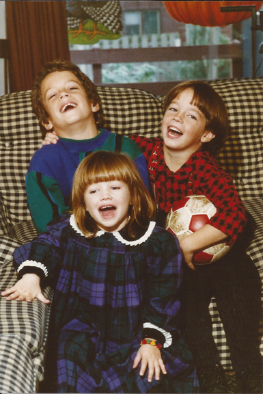 Nate with Ethan and Tess on couch with soccer ball copysm